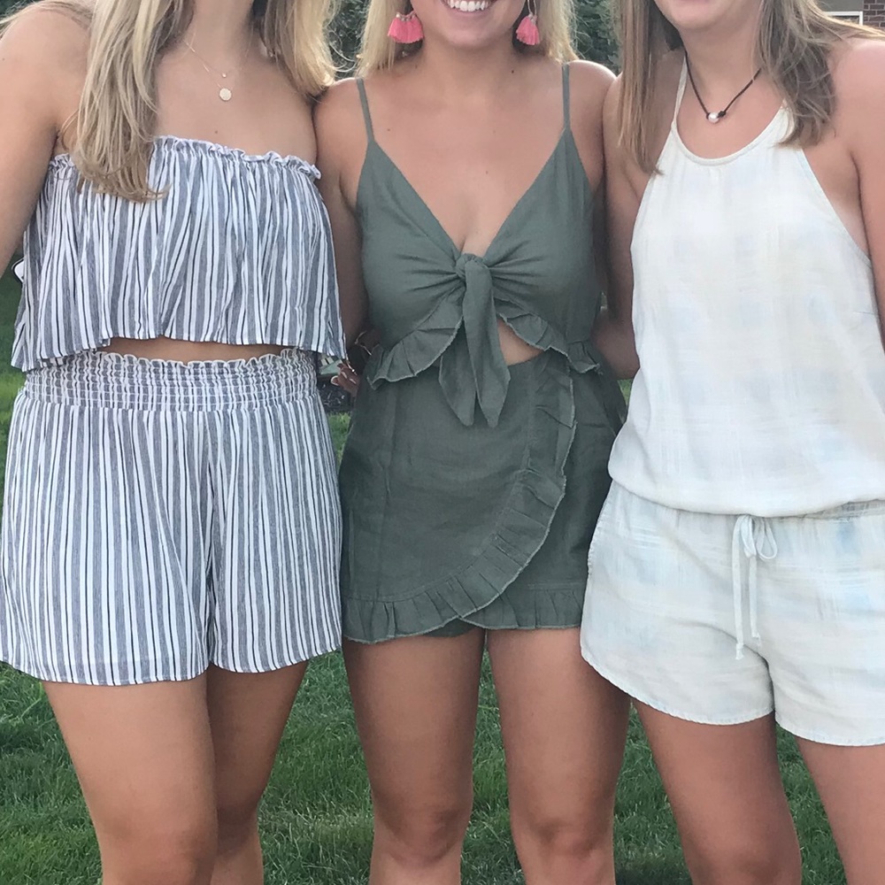 Green romper (in middle)